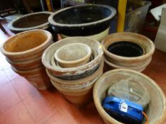 TWO VINTAGE CROCKS and a quantity of terracotta plant pots etc, various measurements