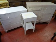 A SMALL PAINTED PINE DRESSER BASE having two drawers and two cupboards, 94.5 cms high, 117 cms wide,