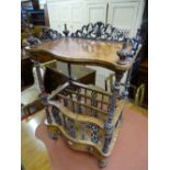 A WALNUT CANTERBURY WHATNOT having a shaped upper shelf with bobbin and carved gallery etc and