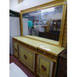 A LARGE ITALIAN STYLE GILT DECORATED MIRROR BACK SIDEBOARD, 216 cms high overall, 221 cms wide
