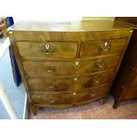 A GEORGIAN MAHOGANY BOW FRONT CHEST of two short over three long drawers with string inlay