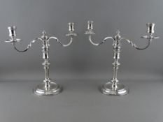 A PAIR OF TWIN BRANCH SOLID SILVER CANDELABRA for Boodle & Dunthorne, Liverpool, hallmarked London