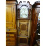 A LATE 19th CENTURY OAK & MAHOGANY LONGCASE CLOCK having a painted arched dial and eight day