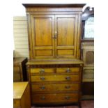 A GEORGIAN OAK & CROSSBANDED MAHOGANY PRESS CUPBOARD, the panelled top doors with Sheraton shell