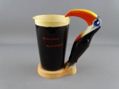 AN ORIGINAL 'MY GOODNESS, MY GUINNESS' ADVERTISING TOUCAN JUG, the base marked 'Produced in Great