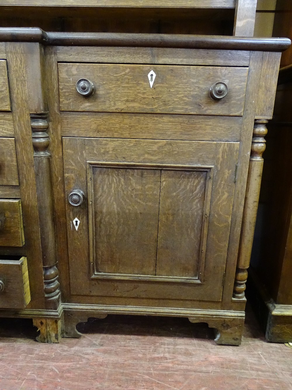 A MID 19th CENTURY OAK WELSH DRESSER having a three shelf rack with turned end pillars and - Image 3 of 3