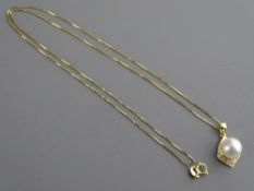 A FOURTEEN CARAT GOLD NECK CHAIN with a Japanese Akoya pearl pendant on a five diamond set mount,