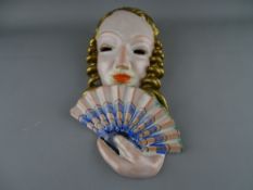 A GOLDSCHEIDER OF AUSTRIA ART DECO POTTERY WALL MASK, indistinct impressed no. with maker's