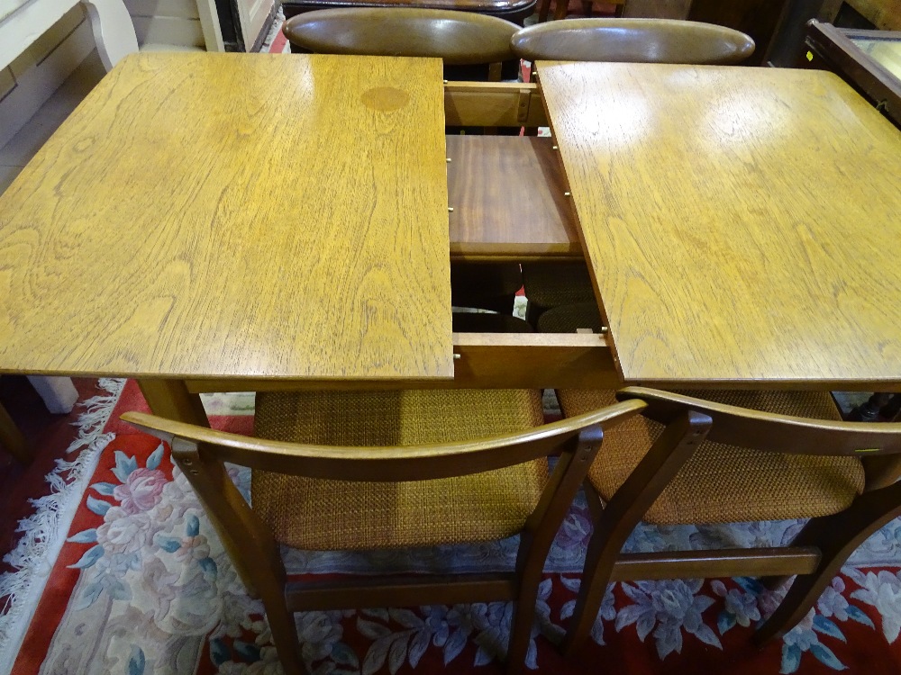 A VINTAGE TEAK EFFECT DINING ROOM SUITE of sideboard, table, six chairs and two tier trolley, - Image 4 of 5