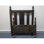 A PAIR OF JACOBEAN OAK STYLE SINGLE BED ENDS, 121 cms high, 91.5 cms wide the tallest