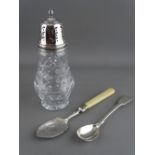 A SILVER TOPPED GLASS SUGAR SIFTER, a chased decorated jam spoon and a single teaspoon, Birmingham