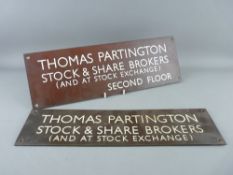TWO BRONZE WALL PLAQUES advertising Thomas Partington Stock & Share Brokers, 28.5 cms long