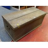 A VICTORIAN PINE LIDDED BLANKET BOX with interior candle box and drawer and iron carry handles, 43