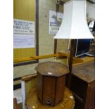 A VINTAGE OAK STANDARD LAMP & SHADE and an Arts & Crafts style octagonal top oak table, 39.5 cms