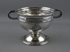 A SILVER 'G A A' FOOTBALL REPLICA TROPHY OF THE SAM MAGUIRE CUP, Dublin hallmarked for 1946, 15