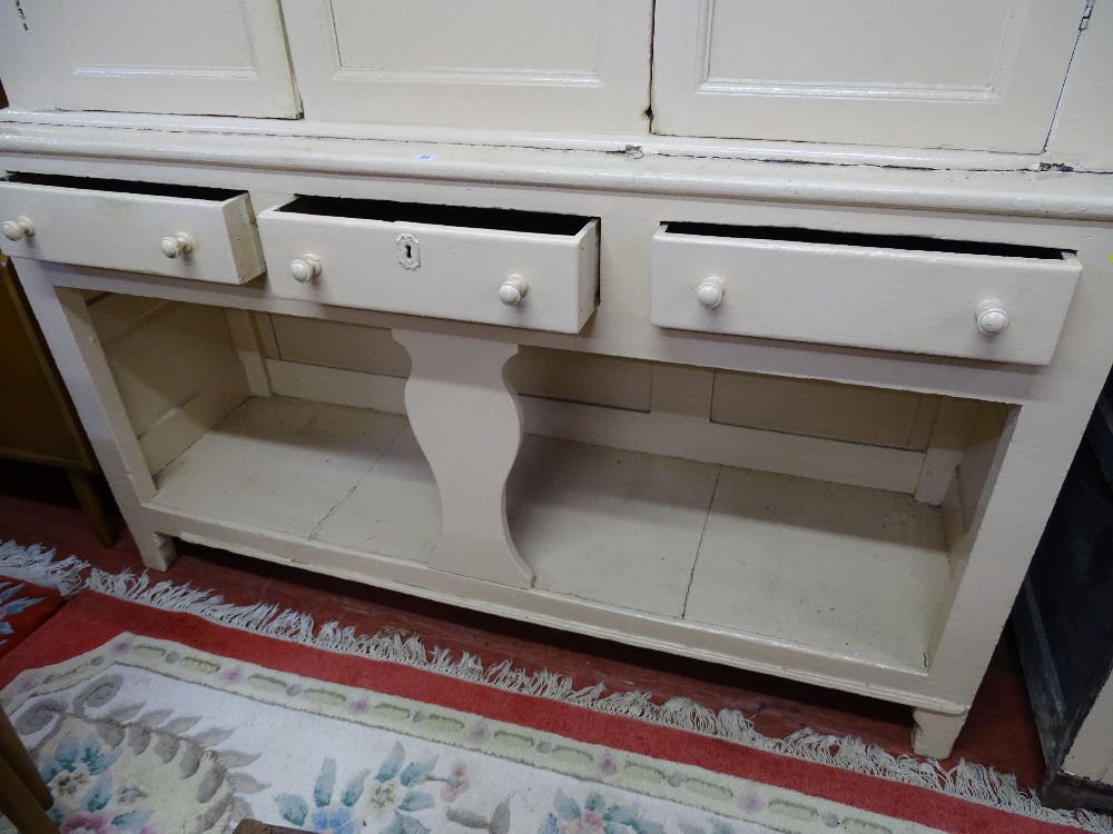 AN INTERESTING CREAM PAINTED PINE HOUSEKEEPER'S CUPBOARD, the upper section having two panelled - Image 3 of 3