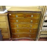 A REGENCY STYLE MAHOGANY SERPENTINE FRONTED CHEST of two short over four long drawers, 114 cms high,