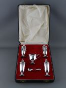 A SILVER FIVE PIECE CRUET SET in a fitted satin and velvet lined case, Sheffield 1965, 7.3 troy