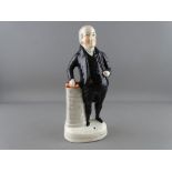 A STAFFORDSHIRE POTTERY FIGURE OF JOHN BRYAN, 26 cms high (crazing, hairline down one side of the