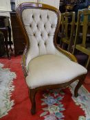 A REPRODUCTION WALNUT EFFECT SPOONBACK BEDROOM CHAIR with button upholstery, 88 cms high, 52 cms