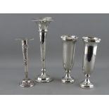 FOUR SILVER BUD VASES including a near pair and one other with Birmingham hallmarks and a floral