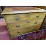 A MAHOGANY CHEST OF THREE LONG DRAWERS with fancy brass backplates and escutcheons, with swan neck