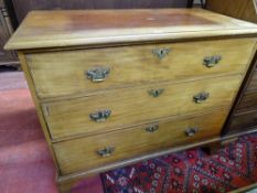 A MAHOGANY CHEST OF THREE LONG DRAWERS with fancy brass backplates and escutcheons, with swan neck