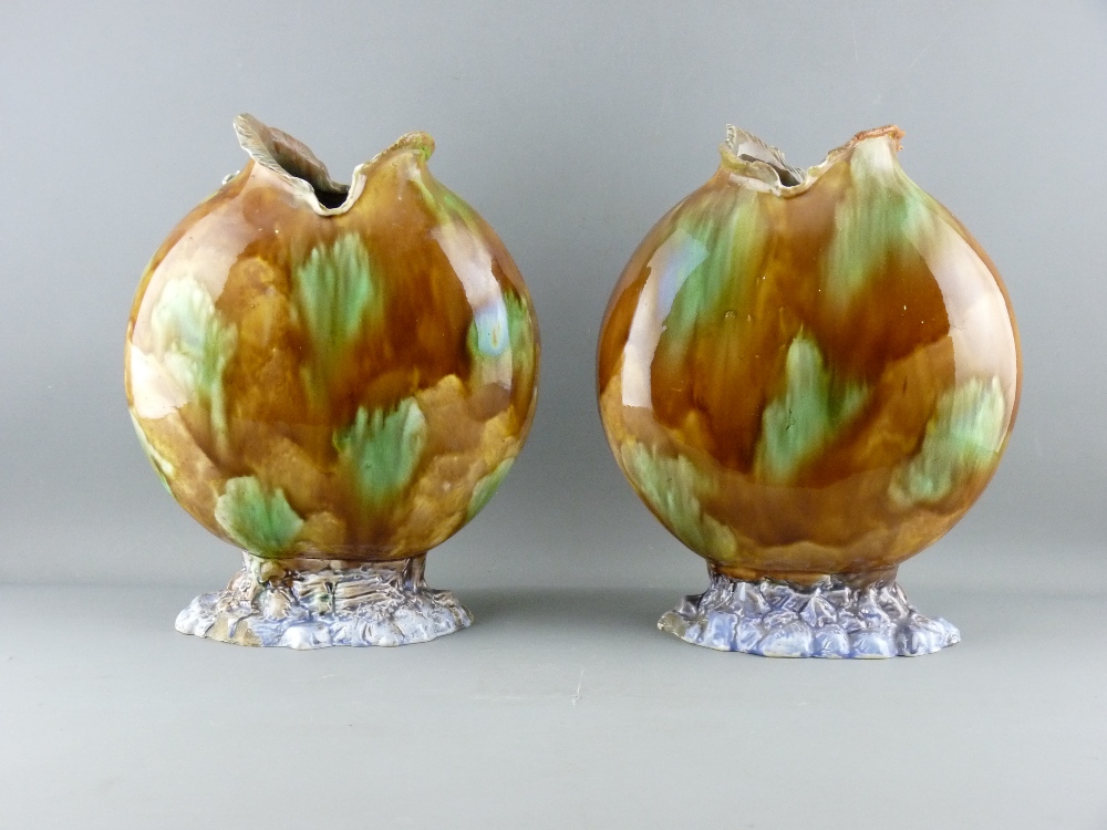A PAIR OF CONTINENTAL MAJOLICA SHELL ENCRUSTED MOON SHAPED VASES, 31 cms high (losses and - Image 2 of 3