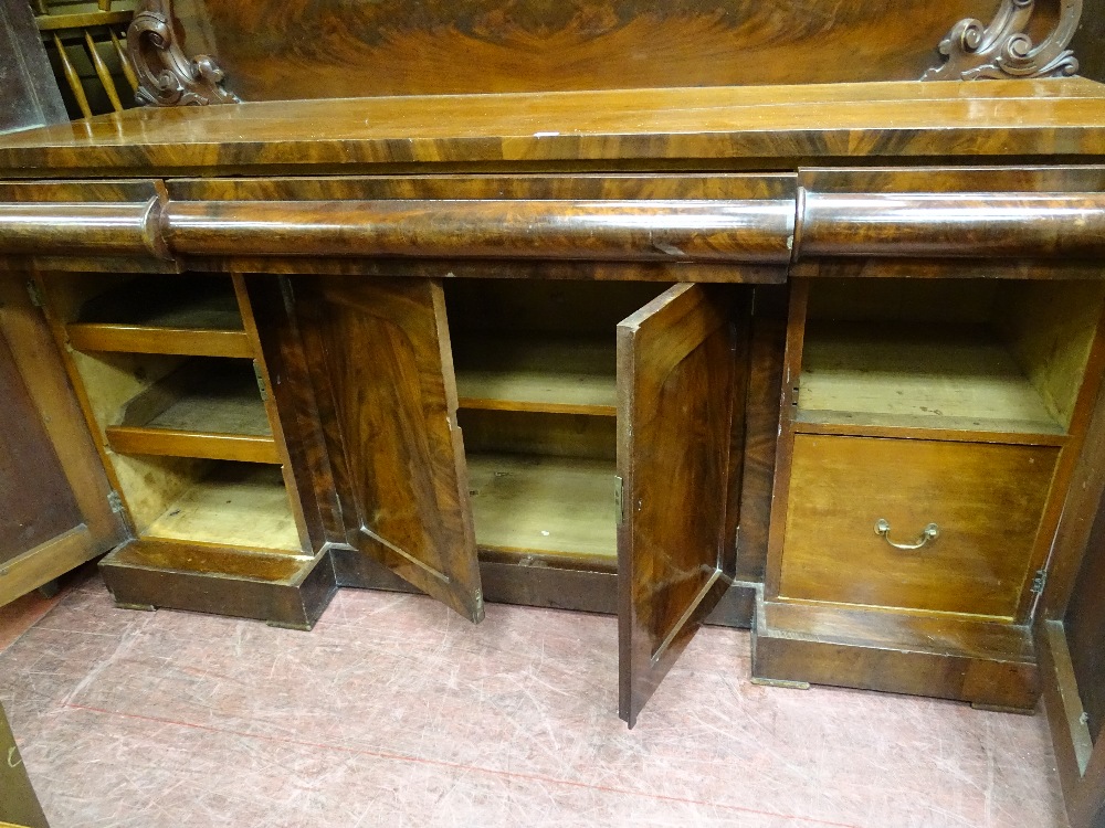 A VICTORIAN DARK MAHOGANY SIDEBOARD having a tall railback with scrolled centre finial and with an - Image 2 of 3