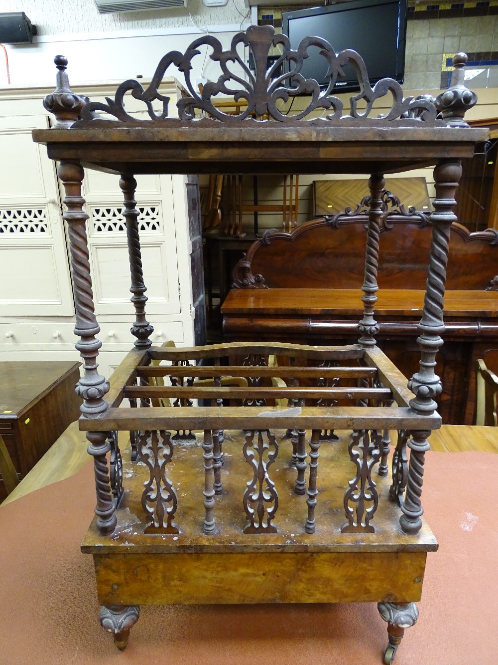 A WALNUT CANTERBURY WHATNOT having a shaped upper shelf with bobbin and carved gallery etc and - Image 3 of 3