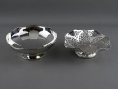 TWO SMALL SILVER BOWLS including a pierced example, 14.5 cms diameter, Sheffield 1955 and one