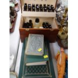 A cased homeopathy set & an album of vintage postcards etc