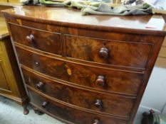 Antique bow front mahogany chest of three long & two short drawers