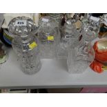 Four good quality cut glass decanters