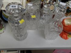 Four good quality cut glass decanters