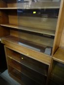 Three vintage sliding door bookcases - one being oak