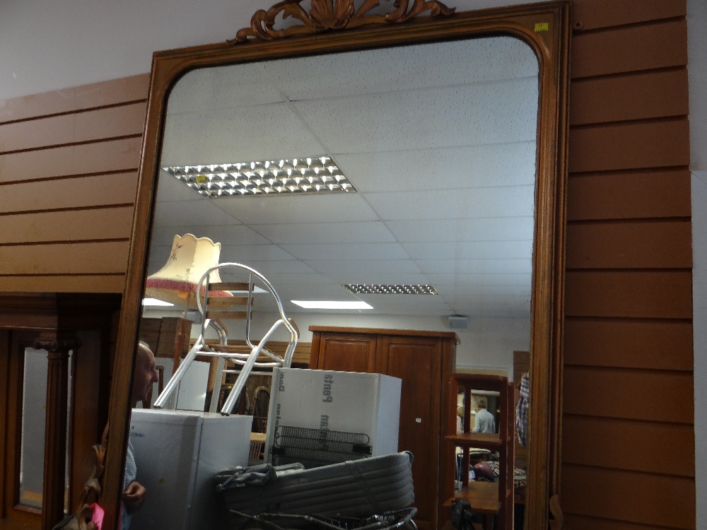 A large vintage gilt framed mirror