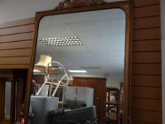 A large vintage gilt framed mirror