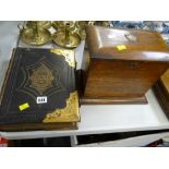 An antique brass bound Bible in Welsh together with a wooden letter rack