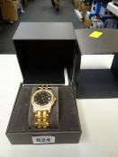 A Gucci diamond decorated yellow metal watch with box & papers