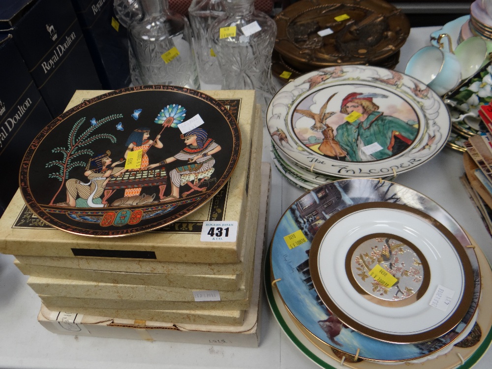 A collection of mainly collectors plates including Egyptian characters, Royal Doulton 'The Falconer'