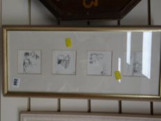 A framed set of four Winnie the Pooh prints