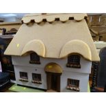 A good model doll's cottage with pseudo thatched roof