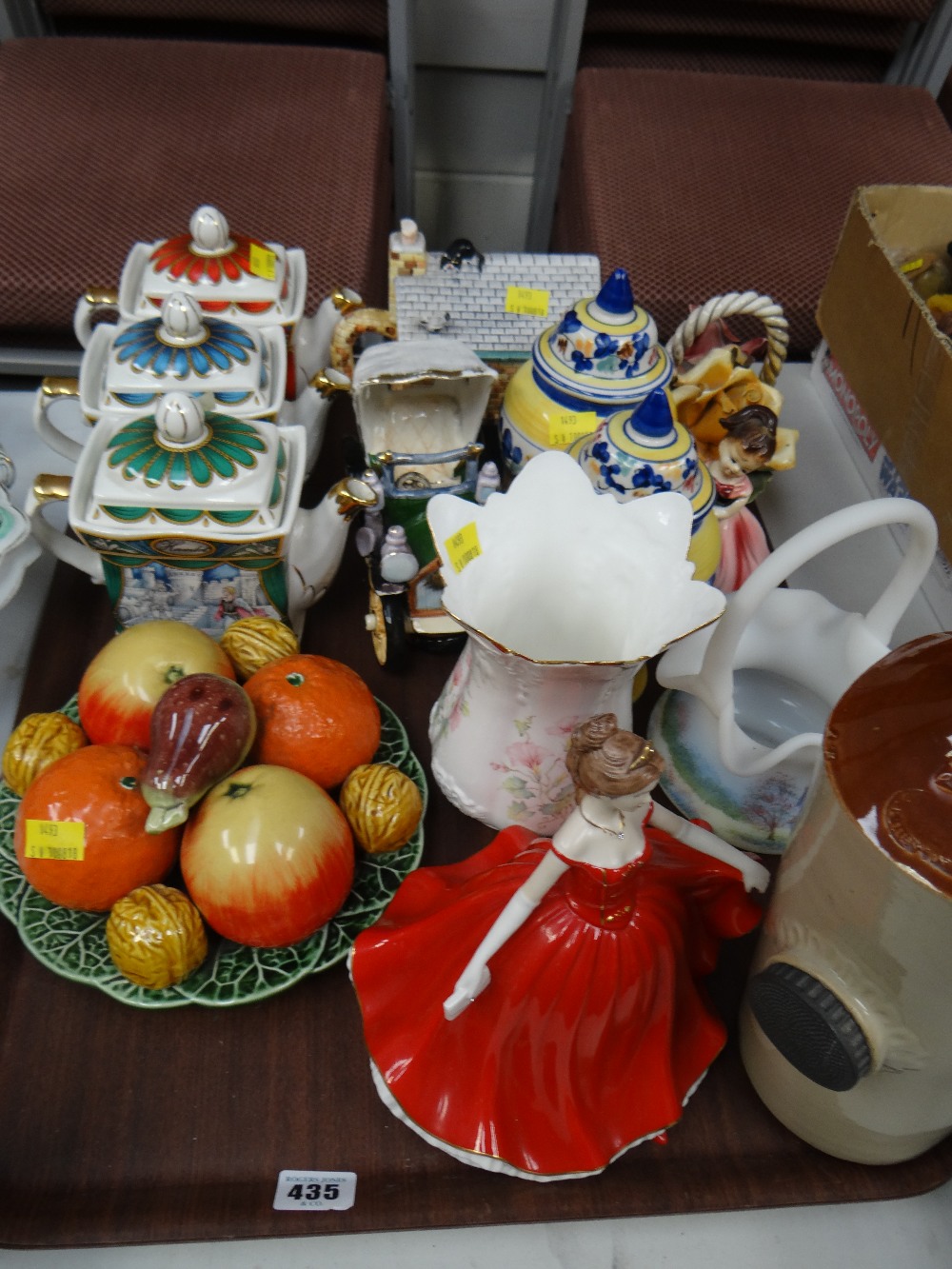 A tray of pottery items including novelty teapots, vases, ceramic hot water bottle & figurines etc