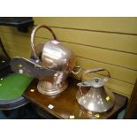 An antique helmet shaped copper coal scuttle with shovel & a copper kettle