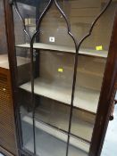 A good quality antique single-door china cabinet (damage to one pane of glass)