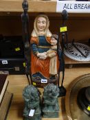 A wooden carved figure of St Anne together with two metal African tribal figures & a pair of green