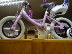 A pink infants practice bicycle with stabilisers (as new)