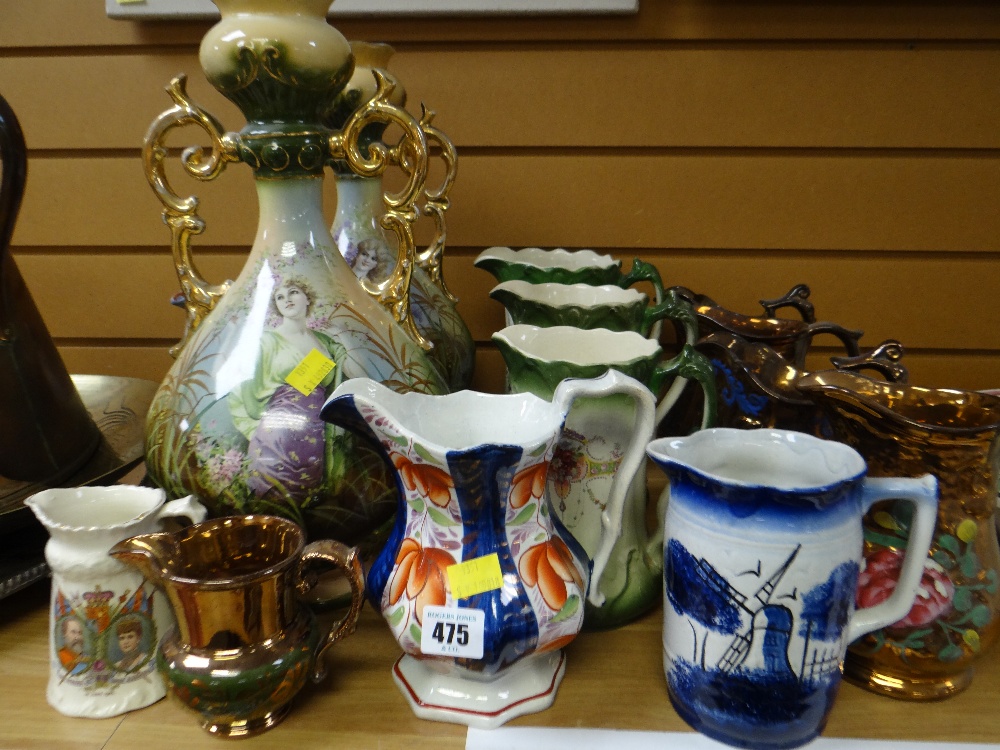 A parcel of pottery jugs including lustre, gaudy Welsh etc together with two large pottery vases