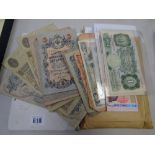 A collection of early Russian & other bank notes together with a quantity of loose stamps divided